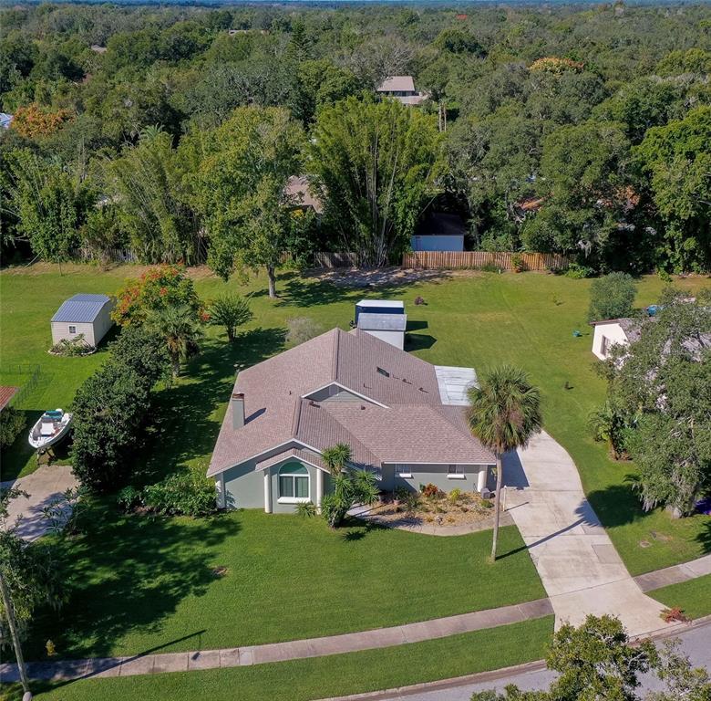 an aerial view of a house with a garden