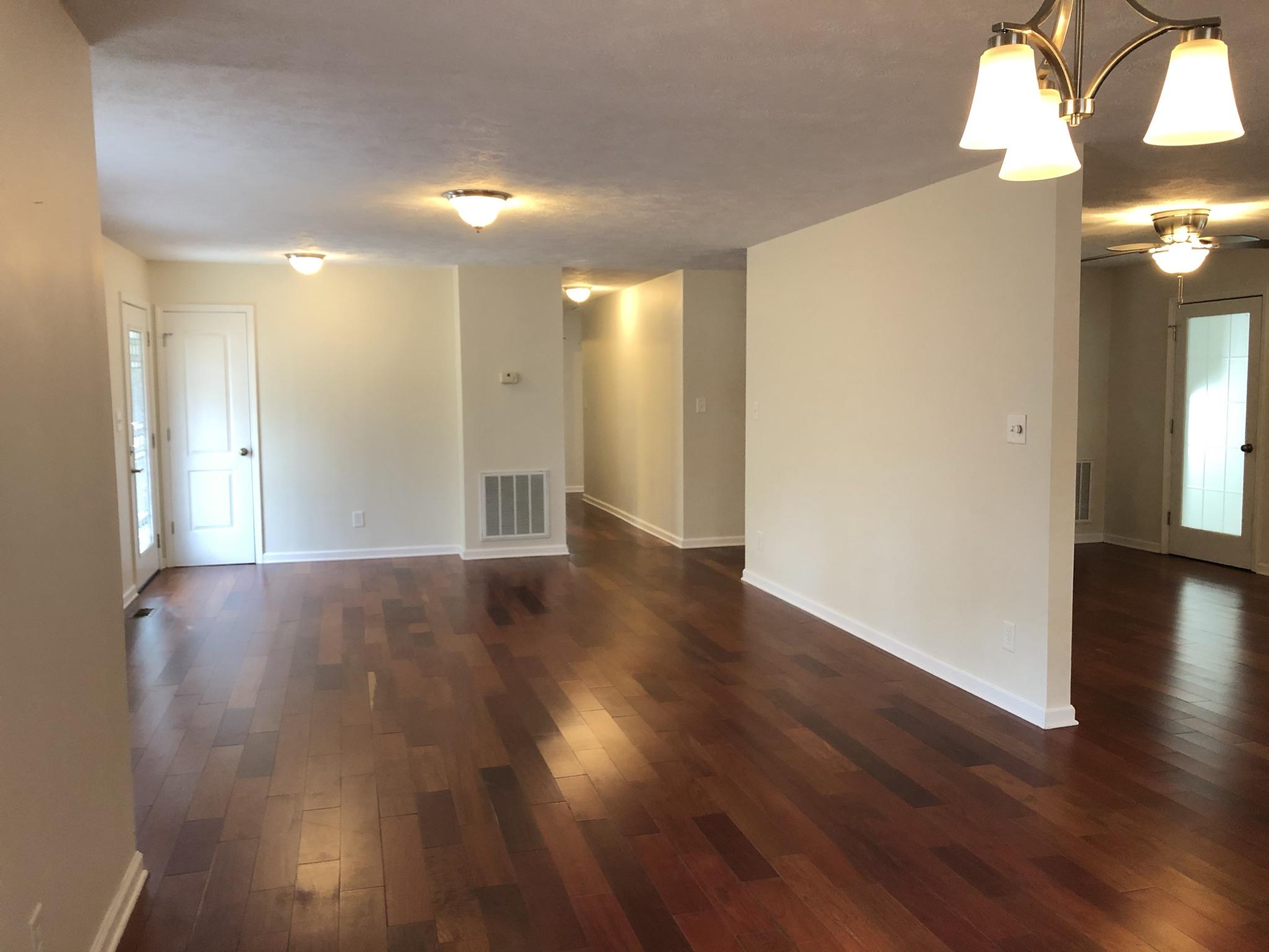 905 Robinwood Road Aberdeen, NC 28315 - Photo 11 of 42 long, spacious living area offers multiple furniture placement options