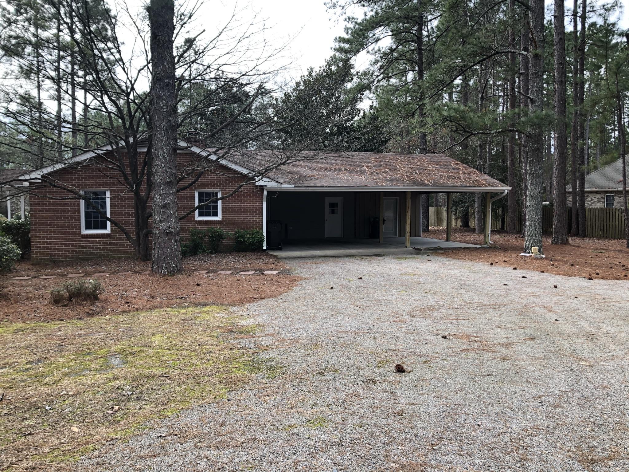 905 Robinwood Road Aberdeen, NC 28315 - Photo 23 of 42 large carport with entrance off of Sun Rd.