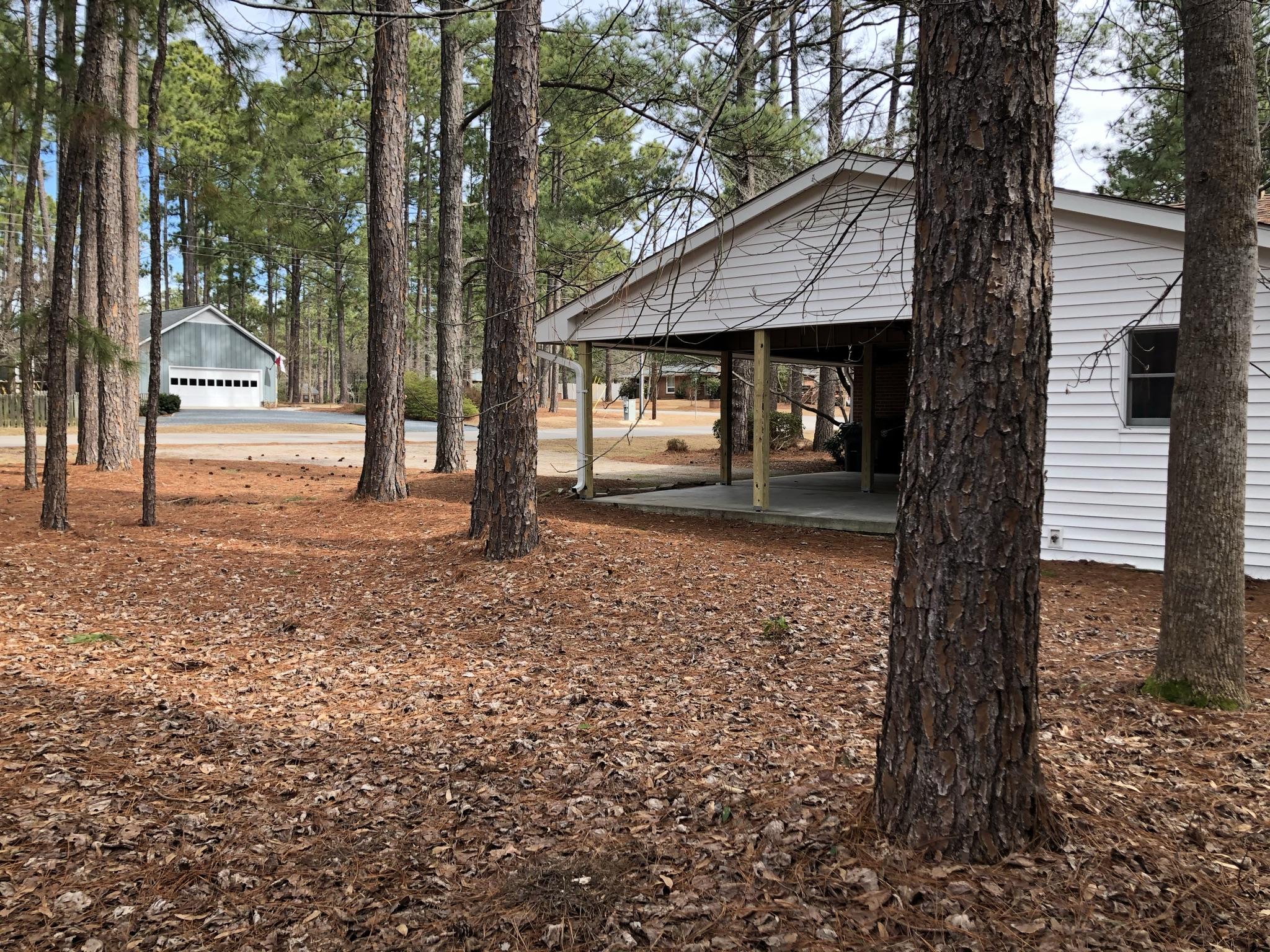 905 Robinwood Road Aberdeen, NC 28315 - Photo 32 of 42 back yard views facing Sun Rd.