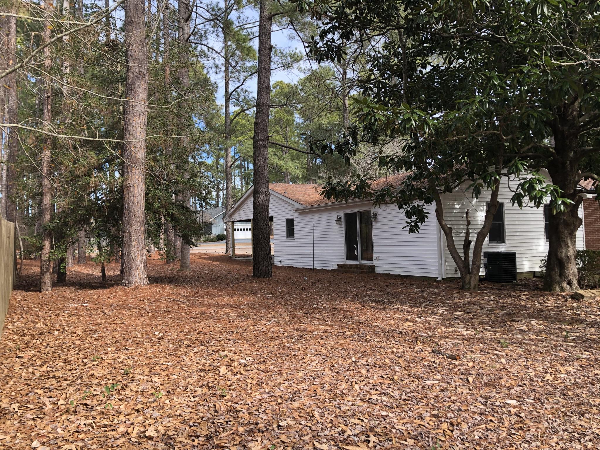 905 Robinwood Road Aberdeen, NC 28315 - Photo 33 of 42 Back yard views from the opposite corner