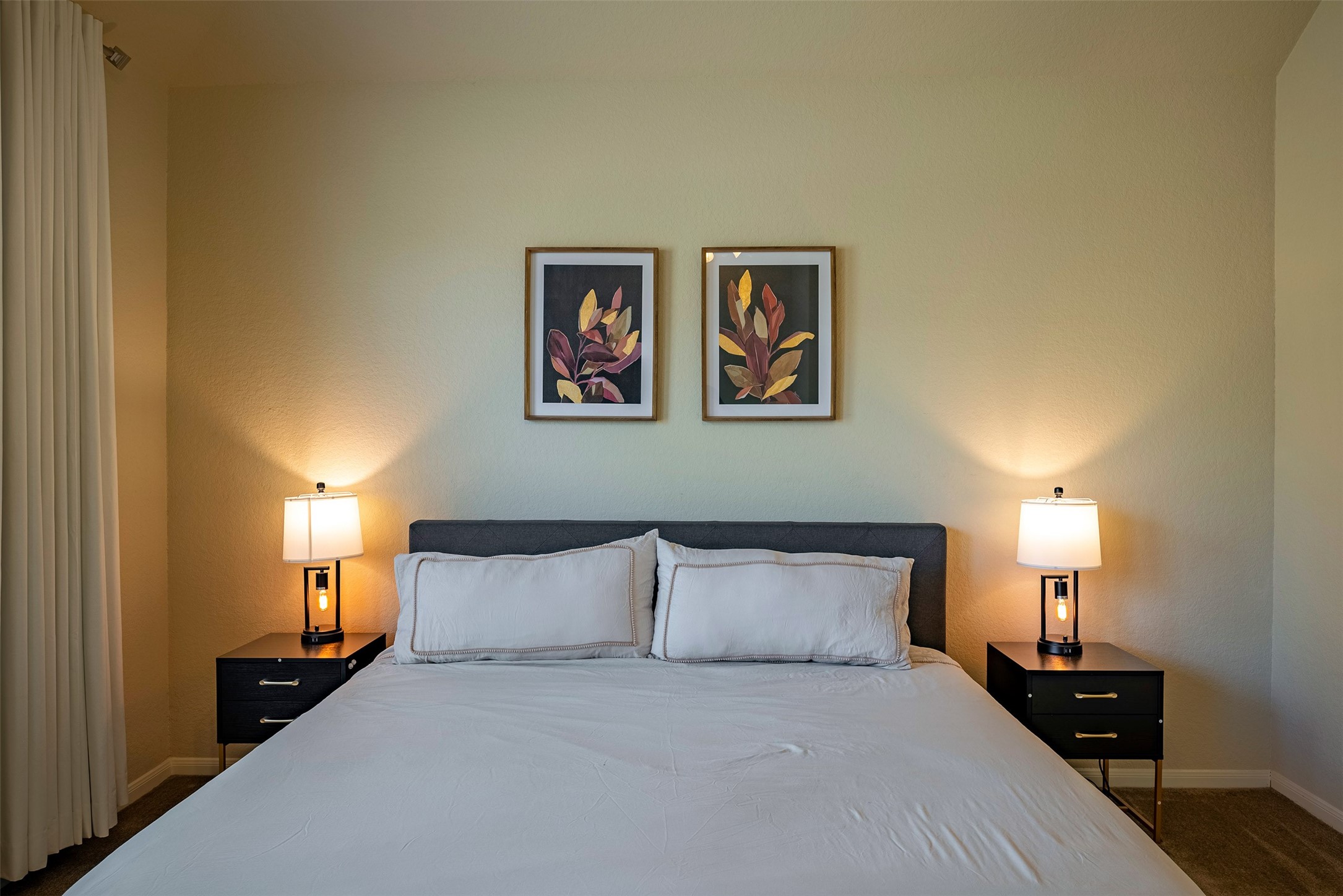 4423 Hidden Oaks Way Houston, TX 77084 - Photo 15 of 29 a bedroom with a bed and lamp