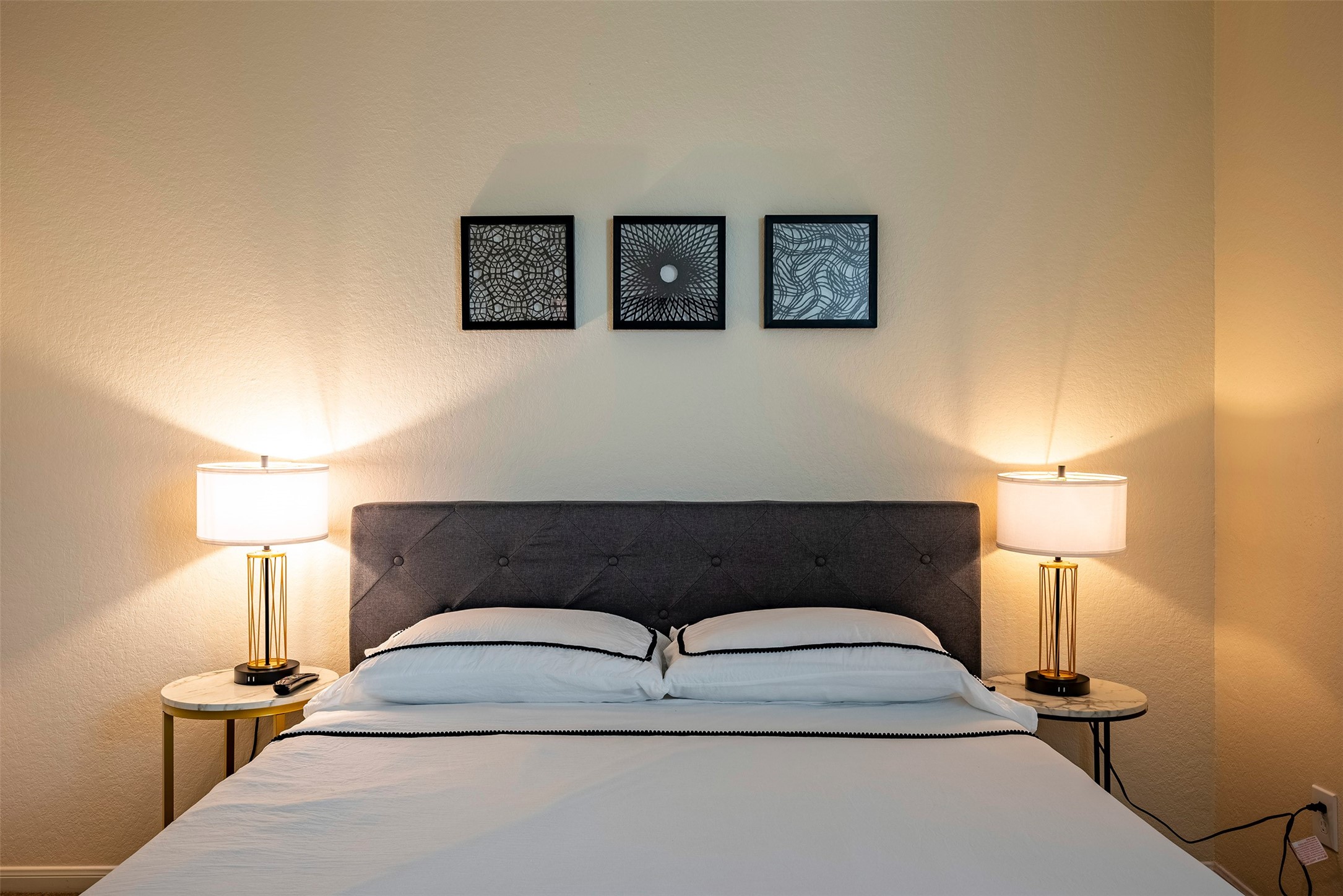 4423 Hidden Oaks Way Houston, TX 77084 - Photo 21 of 29 a bedroom with a bed and a lamp