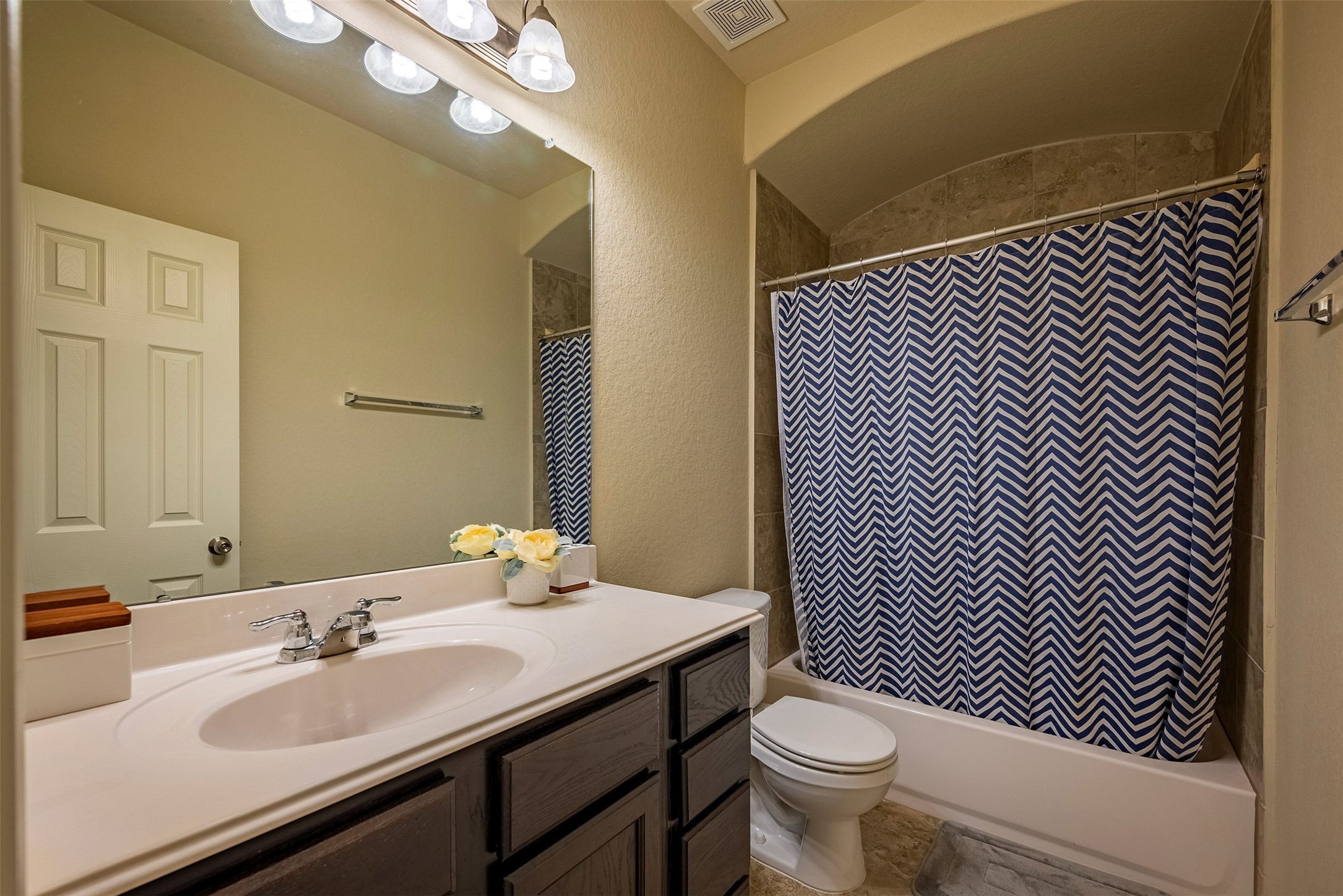 4423 Hidden Oaks Way Houston, TX 77084 - Photo 25 of 29 a bathroom with a sink and a toilet