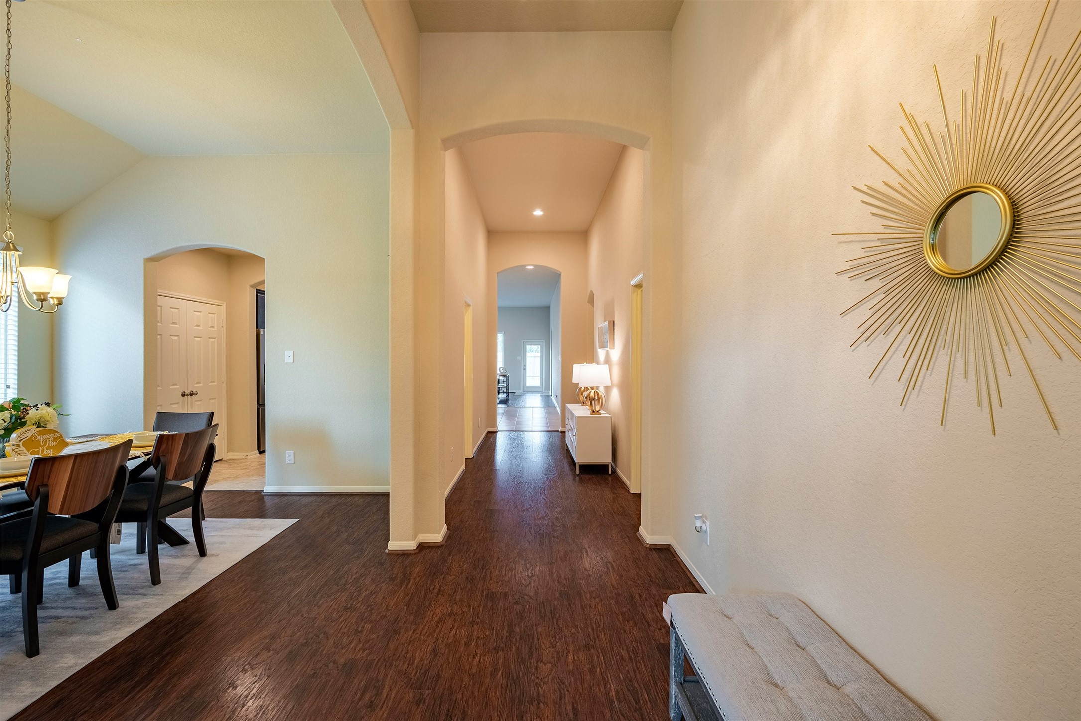 4423 Hidden Oaks Way Houston, TX 77084 - Photo 3 of 29 a view of a dining room with wooden floor