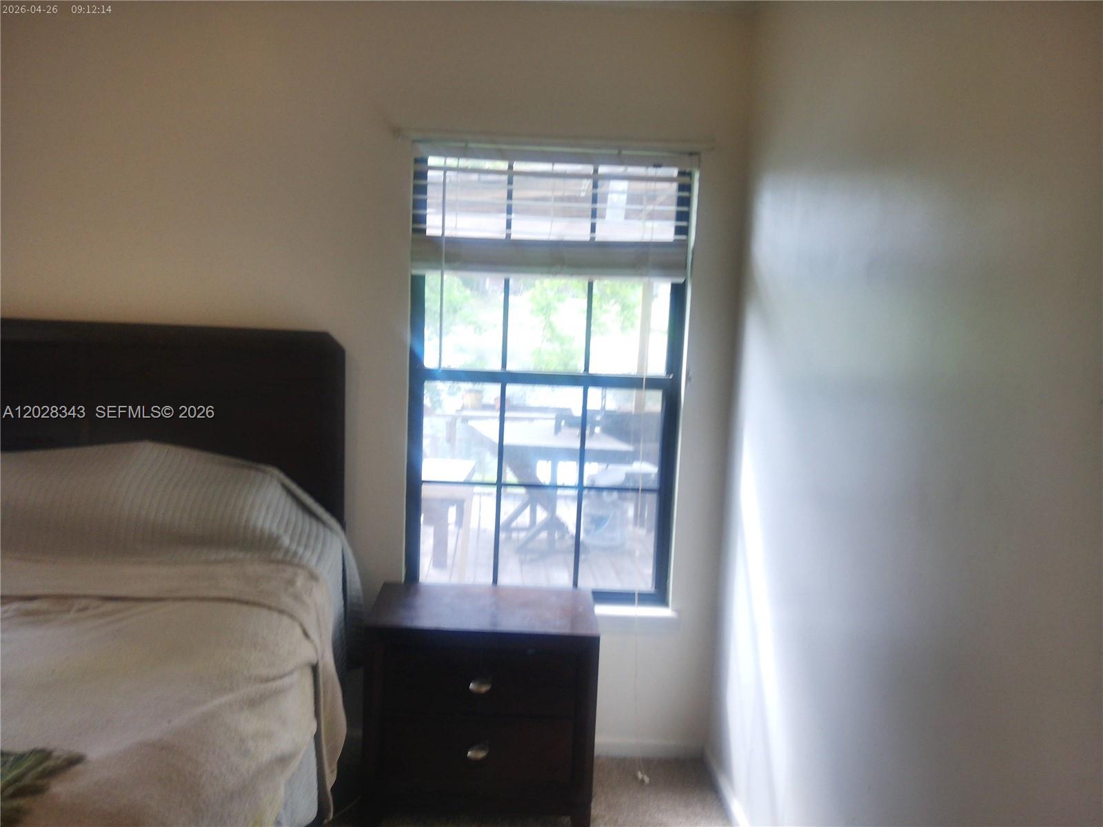 1641 Spring Oaks Lane Jacksonville, FL 32221 - Photo 29 of 44 a bedroom with a bed and a window