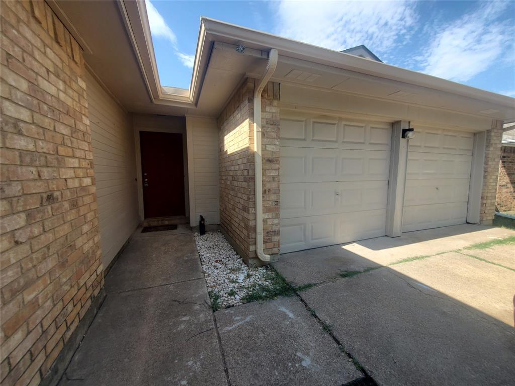 117 Valley Spring Drive Arlington, TX 76018 - Photo 9 of 9 a view of a house with a wooden fence