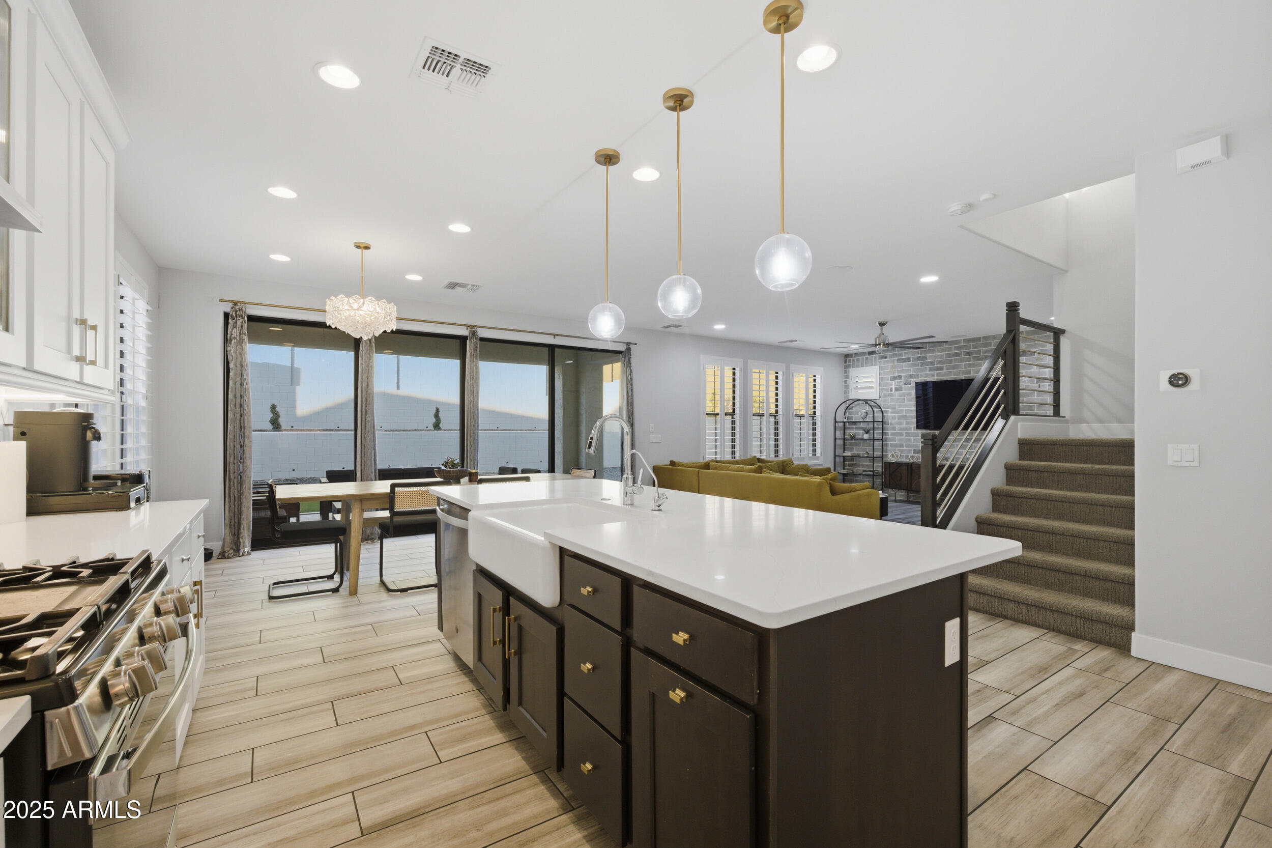 630 West Deer Creek Road Phoenix, AZ 85048 - Photo 11 of 47 a large kitchen with a counter space a sink appliances and a floor