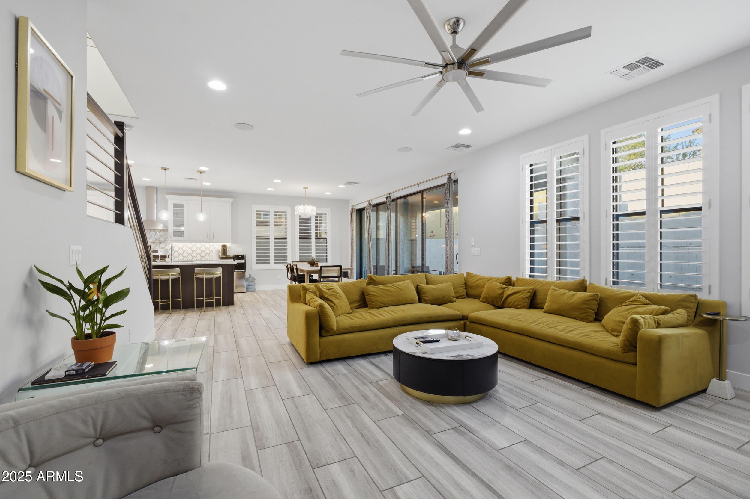 630 West Deer Creek Road Phoenix, AZ 85048 - Photo 13 of 47 a living room with furniture and a large window