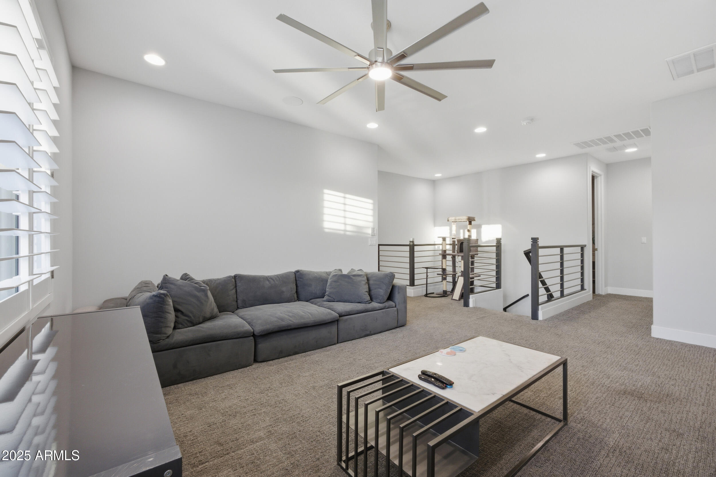 630 West Deer Creek Road Phoenix, AZ 85048 - Photo 17 of 47 a living room with furniture and kitchen view