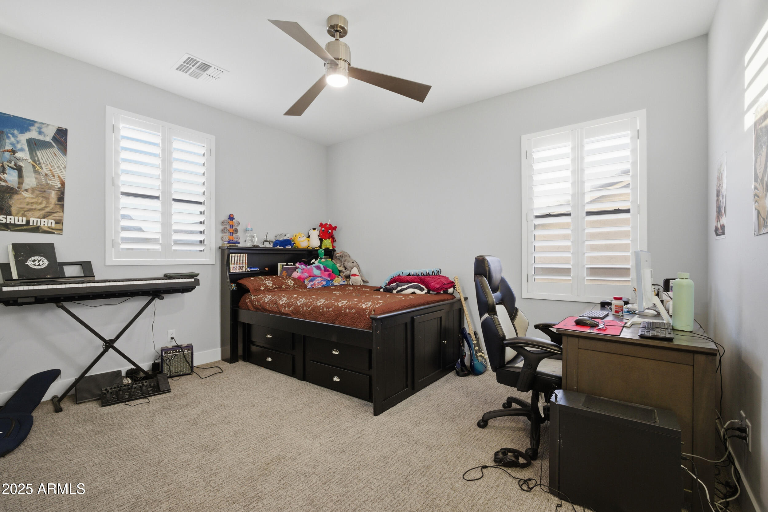 630 West Deer Creek Road Phoenix, AZ 85048 - Photo 20 of 47 a bedroom with a workspace