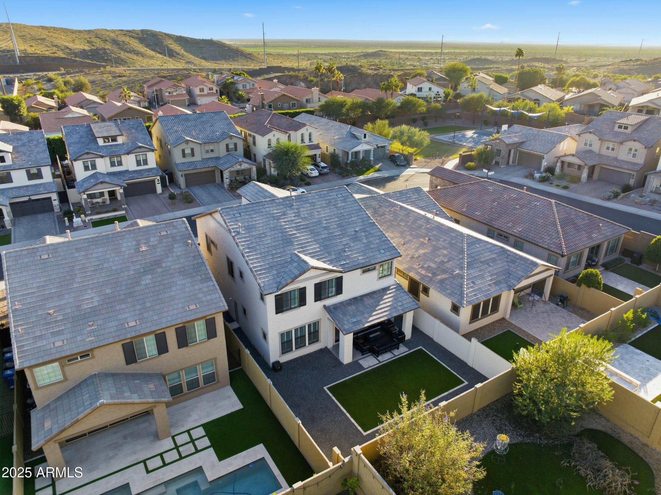 630 West Deer Creek Road Phoenix, AZ 85048 - Photo 2 of 47 an aerial view of residential houses with outdoor space