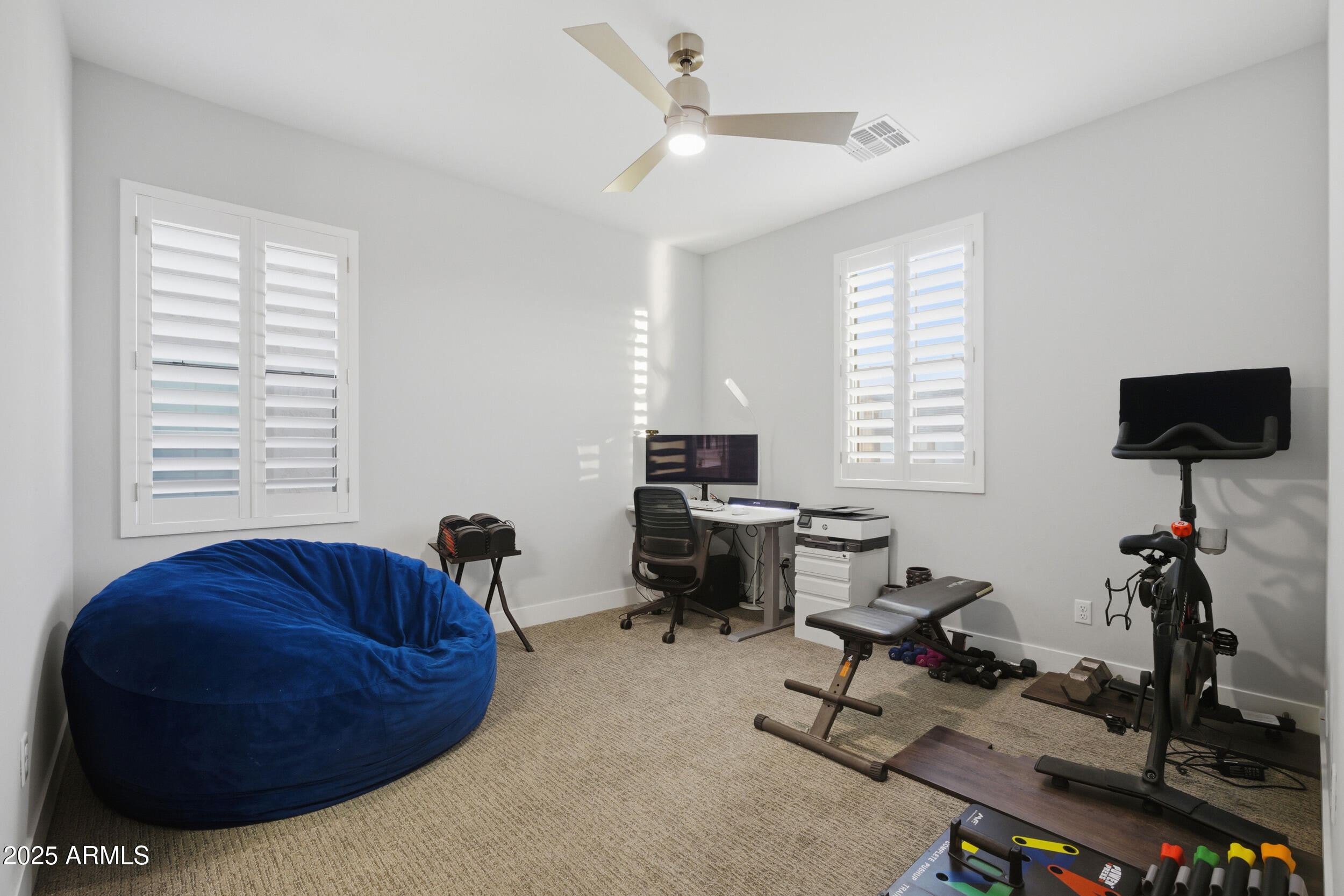 630 West Deer Creek Road Phoenix, AZ 85048 - Photo 24 of 47 a living room with furniture and a window
