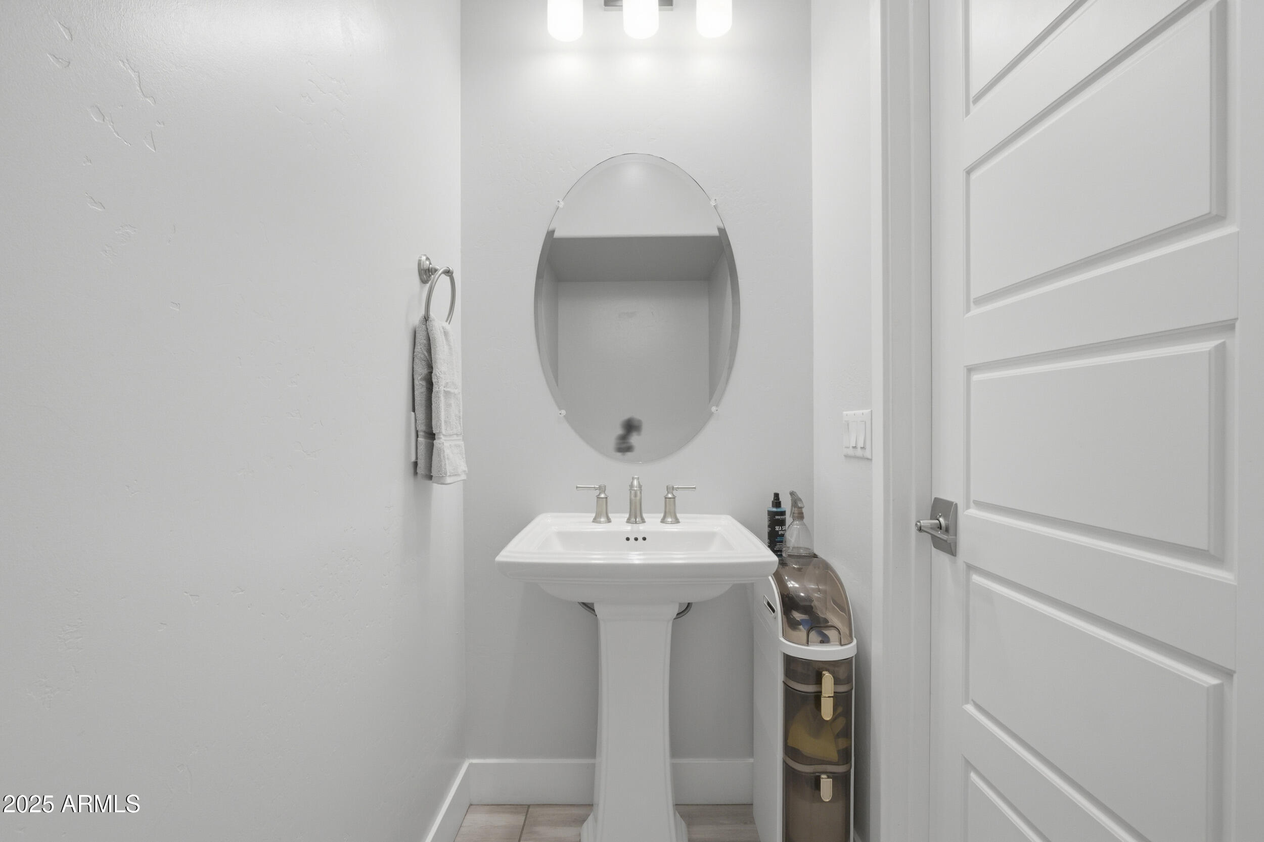 630 West Deer Creek Road Phoenix, AZ 85048 - Photo 29 of 47 a bathroom with a sink and a mirror