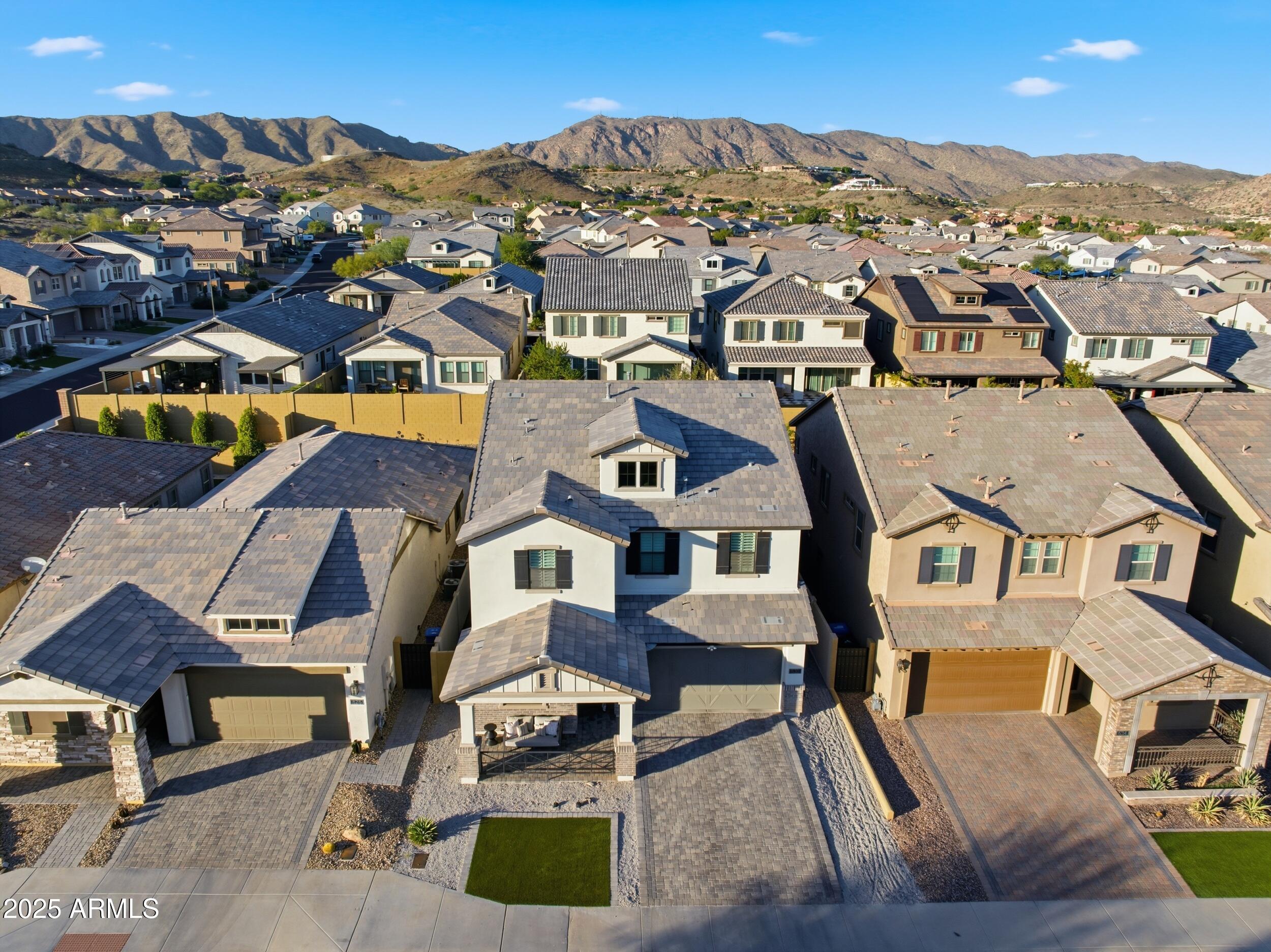 630 West Deer Creek Road Phoenix, AZ 85048 - Photo 38 of 47 an aerial view of residential houses with outdoor space and parking