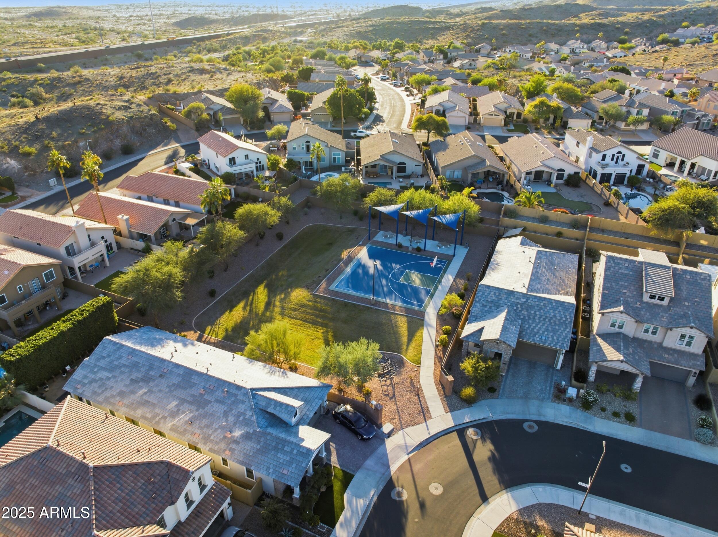 630 West Deer Creek Road Phoenix, AZ 85048 - Photo 46 of 47 an aerial view of residential houses with outdoor space