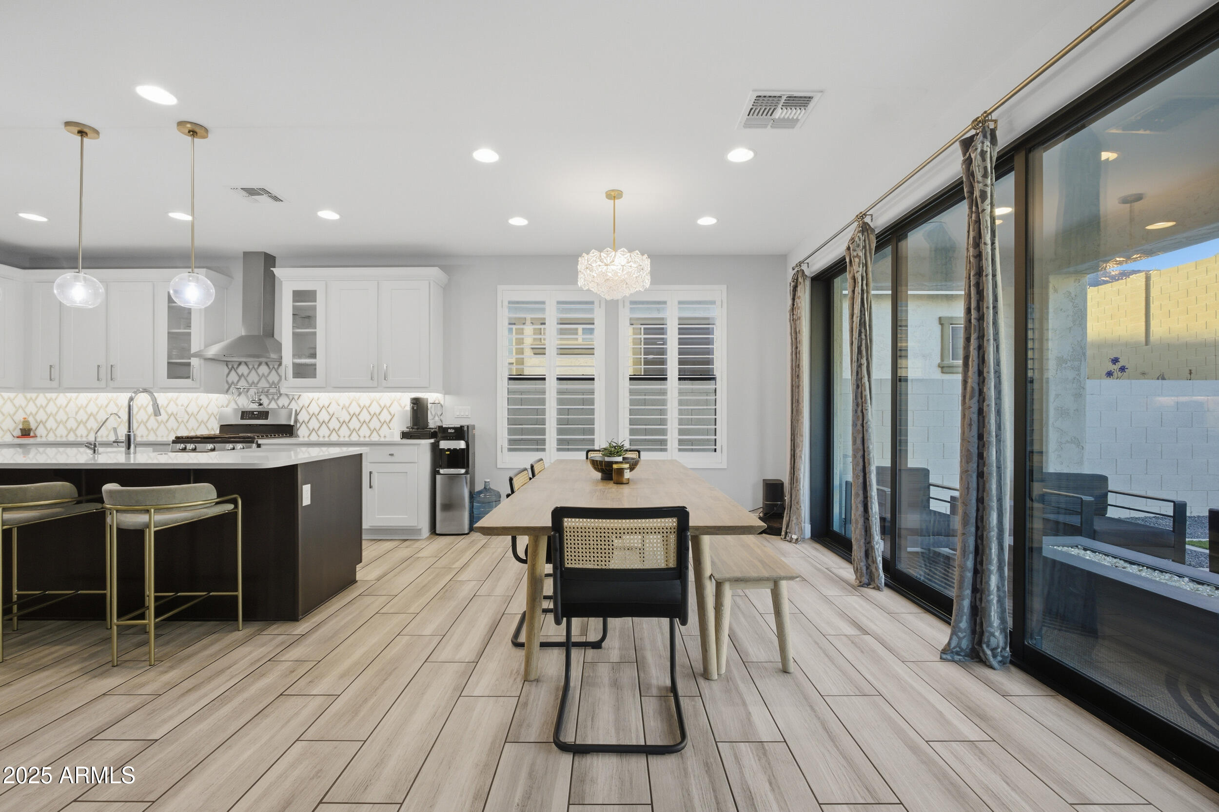 630 West Deer Creek Road Phoenix, AZ 85048 - Photo 10 of 47 a large kitchen with a table and chairs