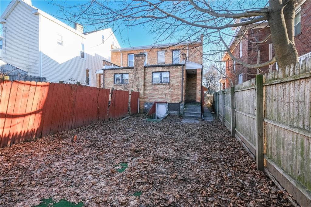 1326 Woodland Avenue Pittsburgh, PA 15212 - Photo 16 of 16 a backyard of a house
