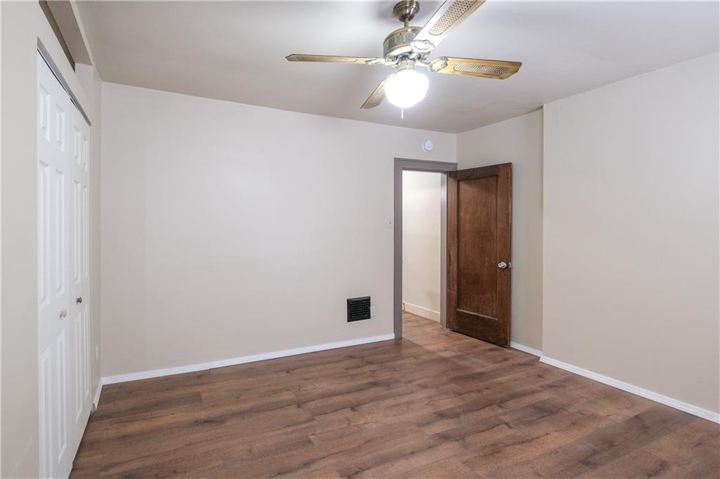 1326 Woodland Avenue Pittsburgh, PA 15212 - Photo 10 of 16 wooden floor in an empty room with a window