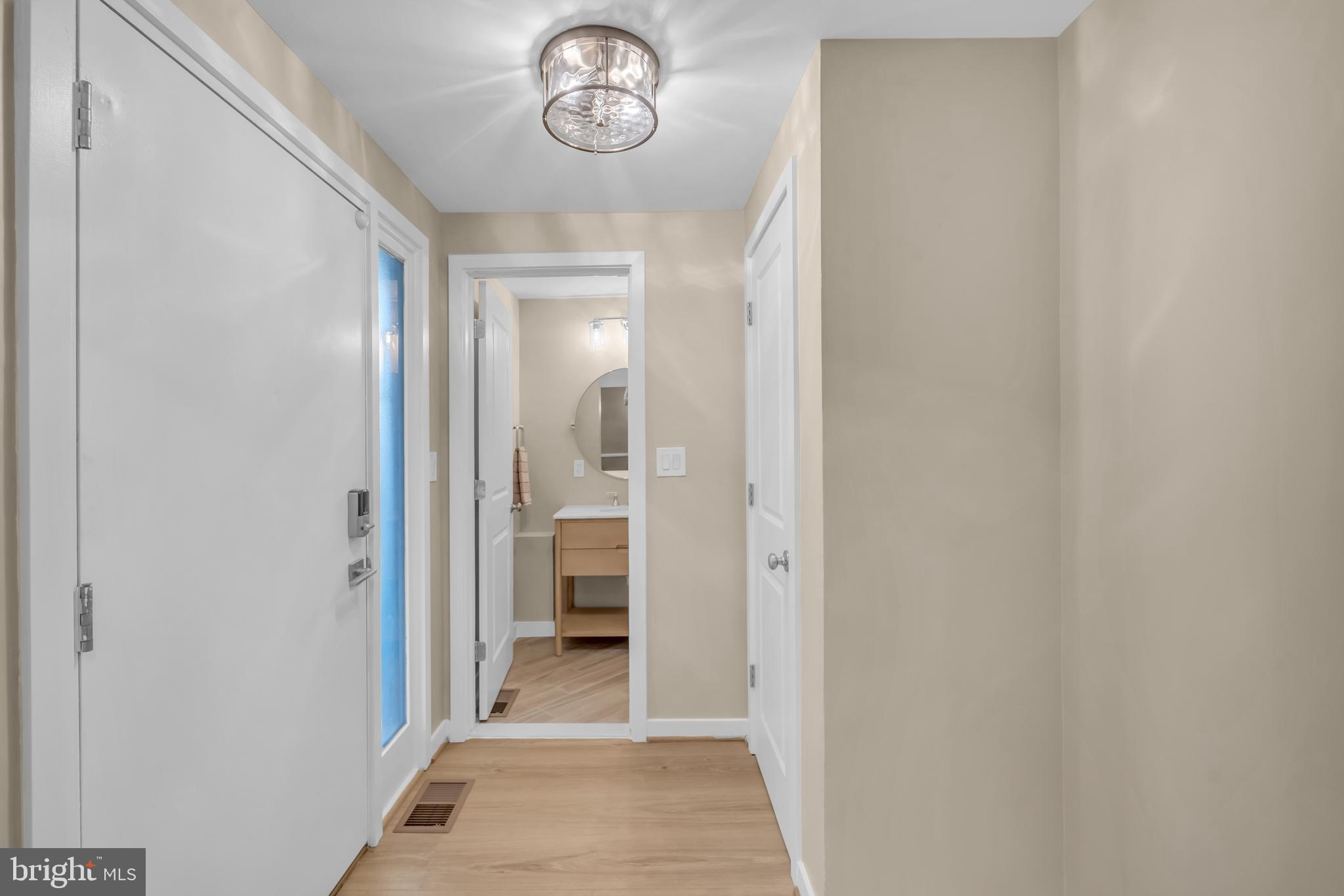 1806 North Shore Court Reston, VA 20190 - Photo 18 of 58 Half bath next to front door