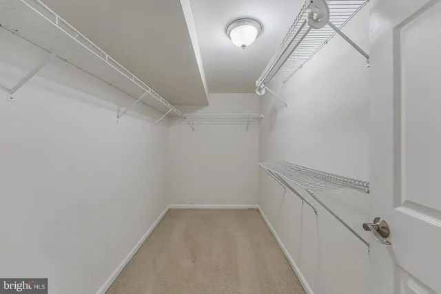 a view of a hallway with entryway