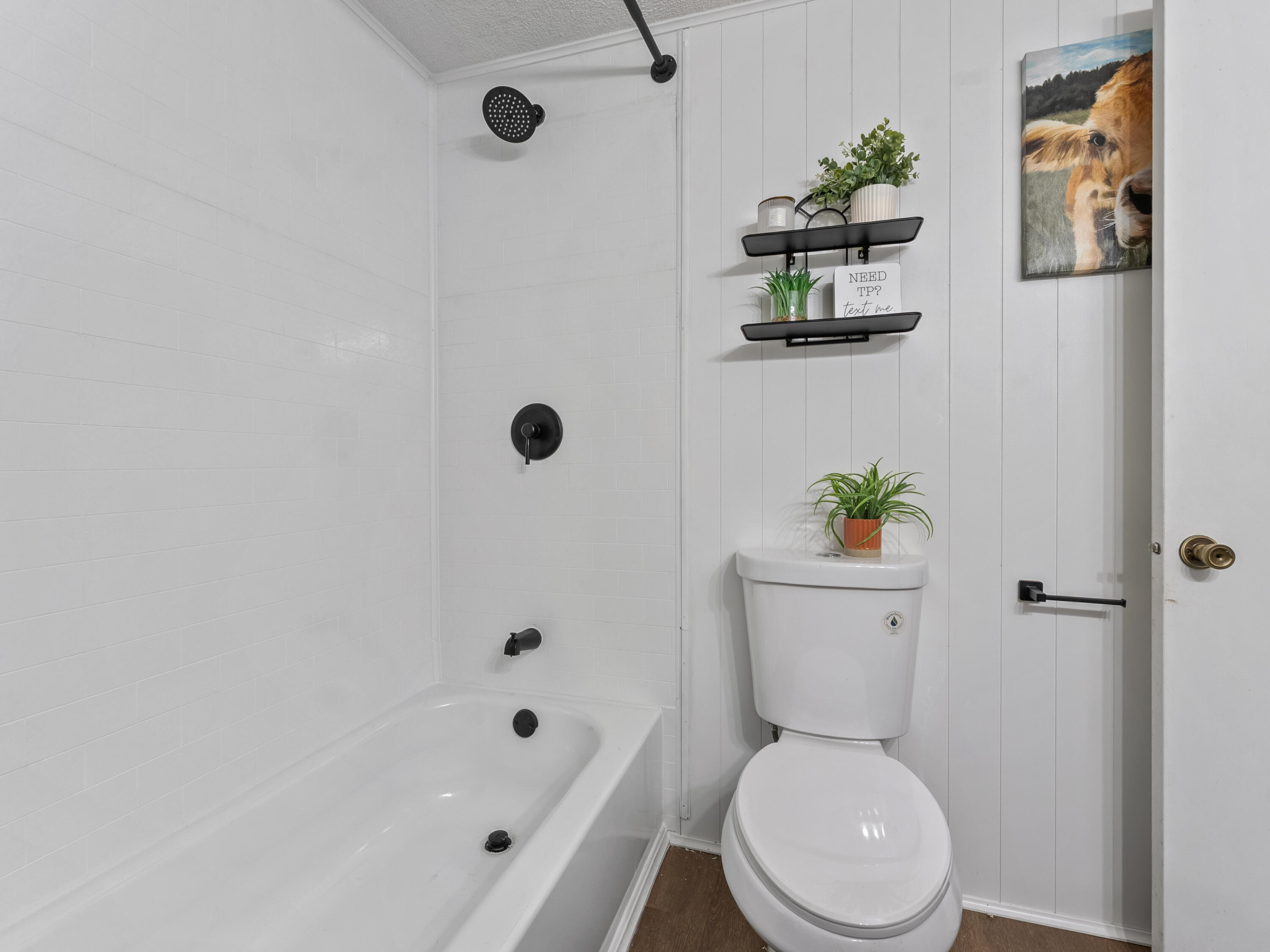 2855 Southwest Monarch Trail Stuart, FL 34997 - Photo 23 of 29 a white toilet sitting next to a bath tub