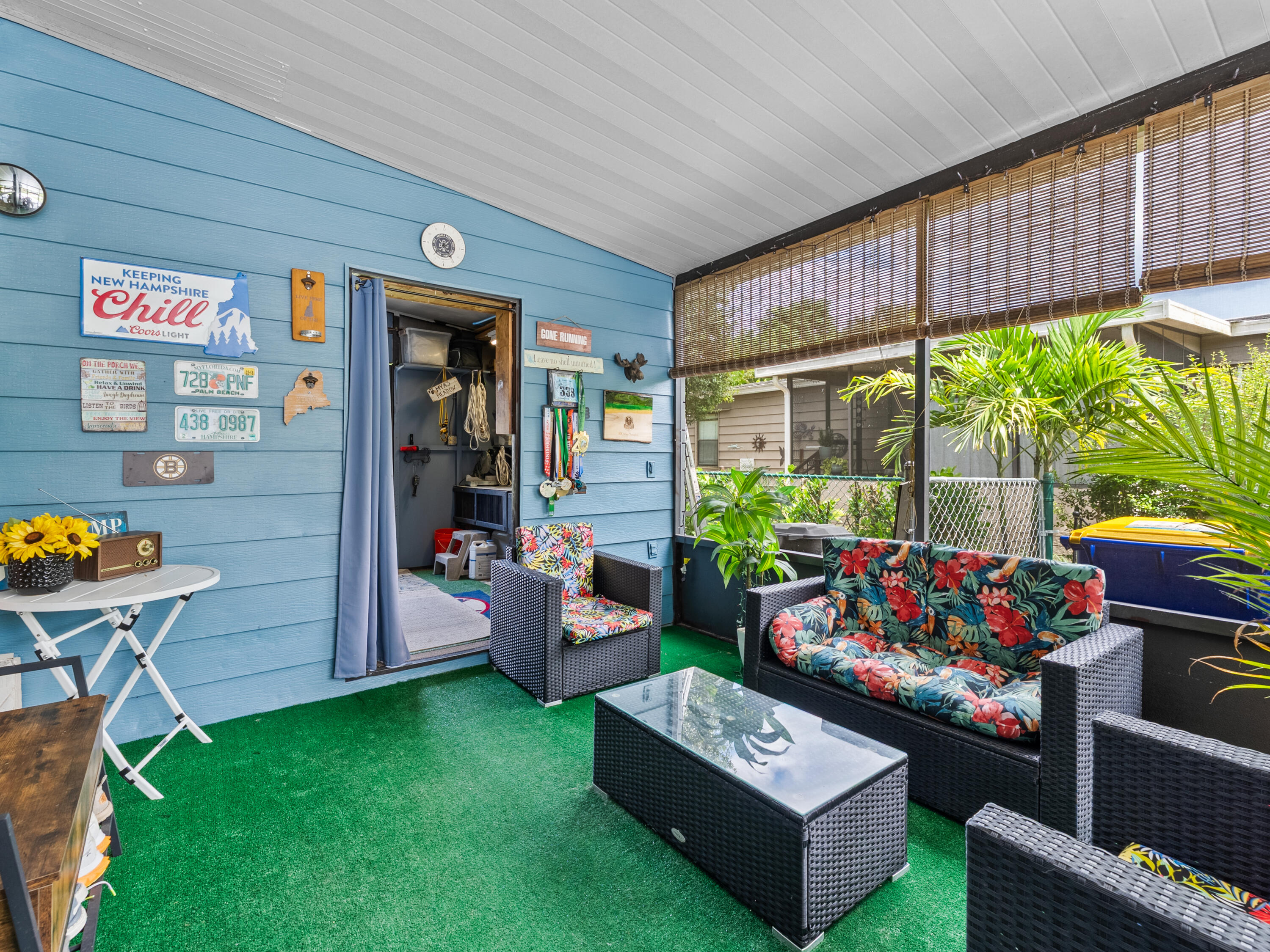 2855 Southwest Monarch Trail Stuart, FL 34997 - Photo 25 of 29 a outdoor living space with furniture and a potted plant