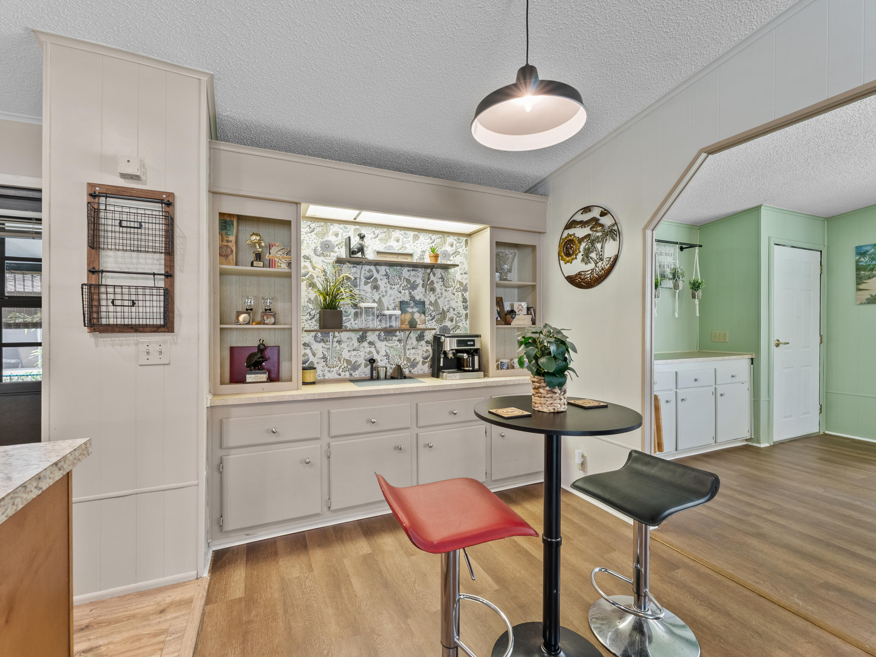 2855 Southwest Monarch Trail Stuart, FL 34997 - Photo 5 of 29 a view of a room with furniture and wooden floor
