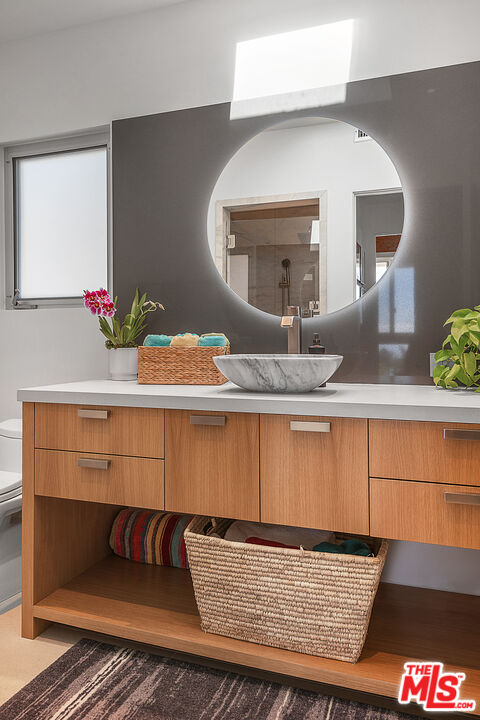 31201 Bailard Road Malibu, CA 90265 - Photo 25 of 56 a bathroom with a sink and a mirror