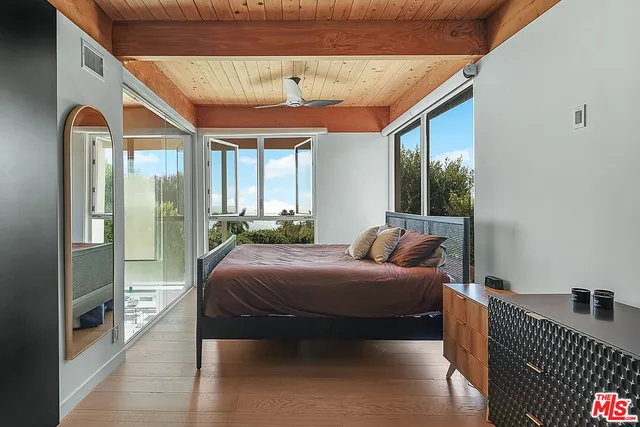 a bathroom with a sink double vanity and a mirror