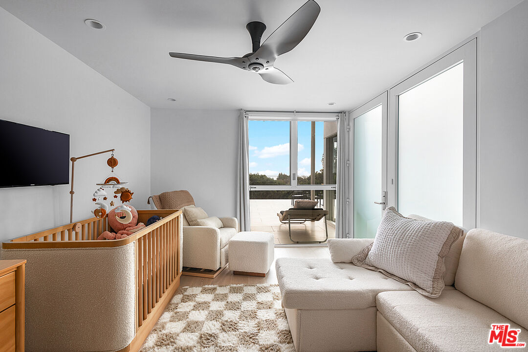 31201 Bailard Road Malibu, CA 90265 - Photo 29 of 56 a room with furniture and flat screen tv