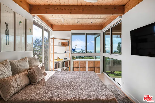 a white bath tub sitting in a bathroom