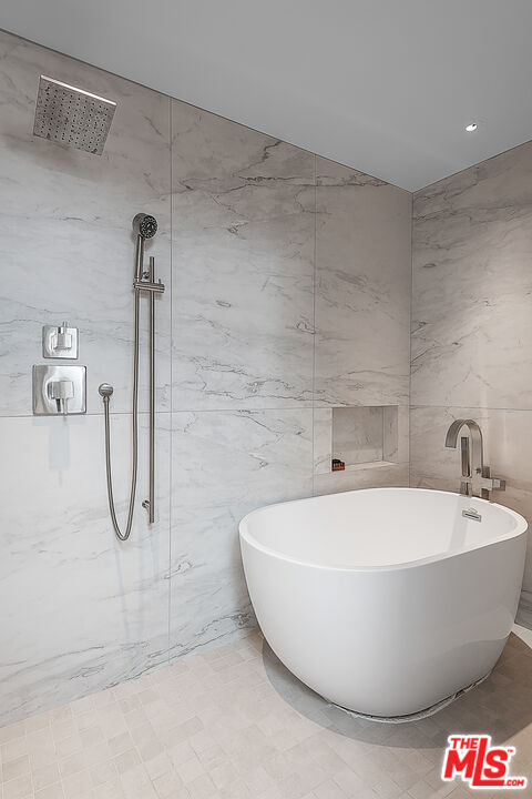 31201 Bailard Road Malibu, CA 90265 - Photo 31 of 56 a white bath tub sitting in a bathroom