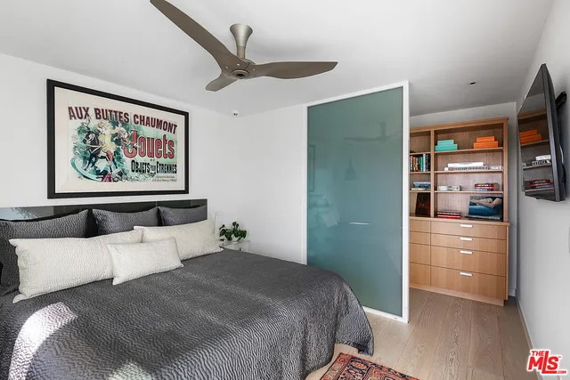 a bathroom with a sink mirror and a bath tub