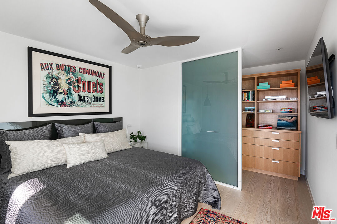 31201 Bailard Road Malibu, CA 90265 - Photo 36 of 56 a bedroom with a bed and a cabinets