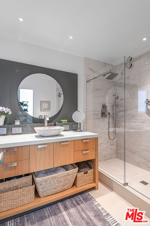 31201 Bailard Road Malibu, CA 90265 - Photo 37 of 56 a bathroom with a sink mirror and a bath tub