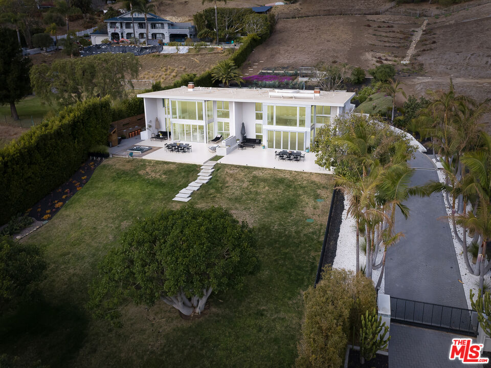 31201 Bailard Road Malibu, CA 90265 - Photo 53 of 56 a view of a house with a yard