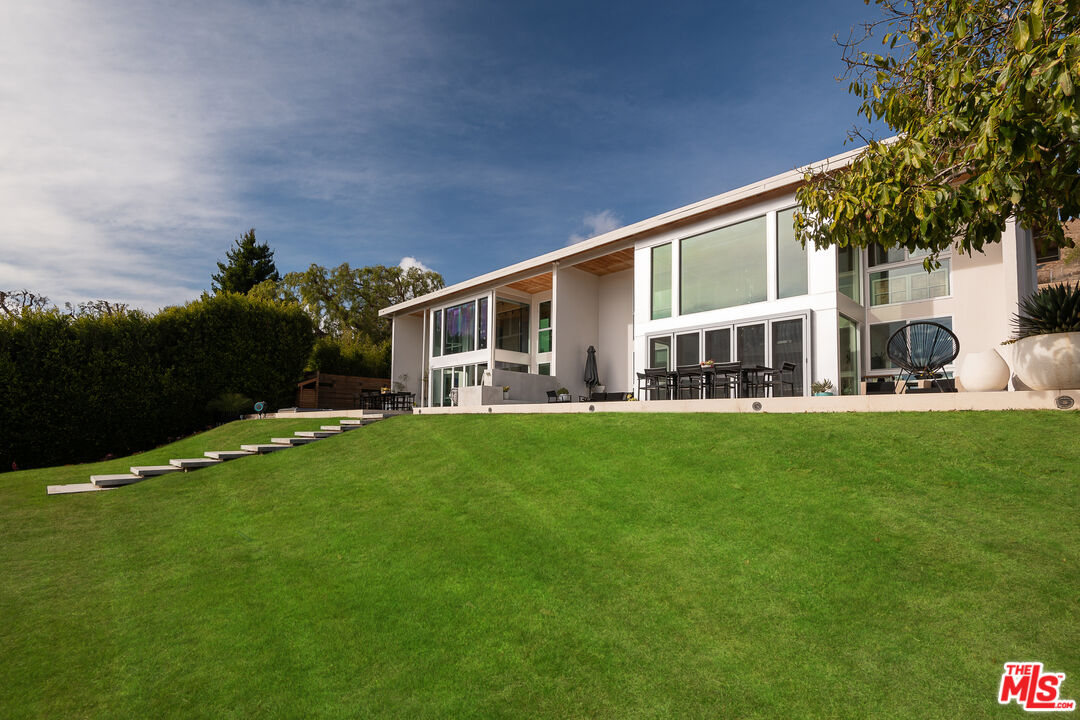 31201 Bailard Road Malibu, CA 90265 - Photo 54 of 56 a front view of house with yard and green space