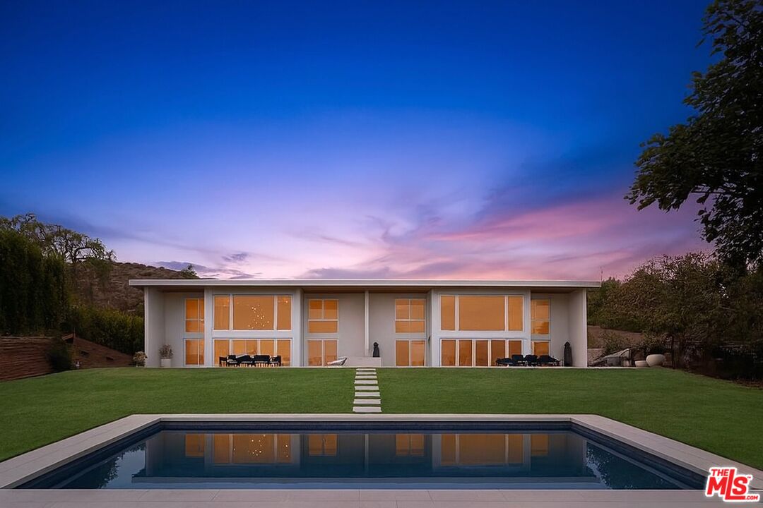 31201 Bailard Road Malibu, CA 90265 - Photo 56 of 56 a front view of a house with a yard