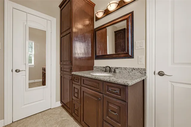 a bathroom with a bathtub and a toilet