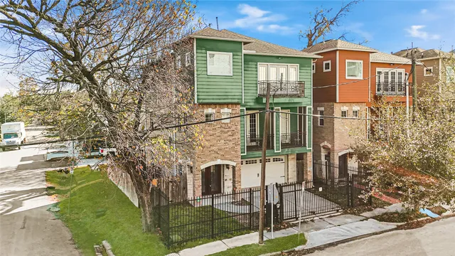 a view of a brick building with many windows