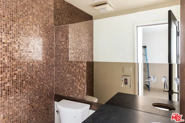 a bathroom with a sink and a shower