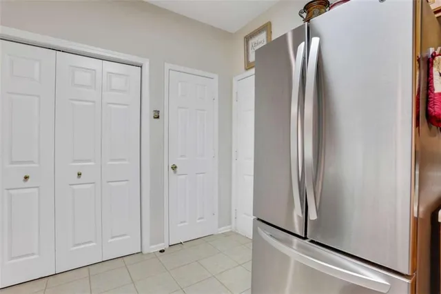 a view of a refrigerator in kitchen
