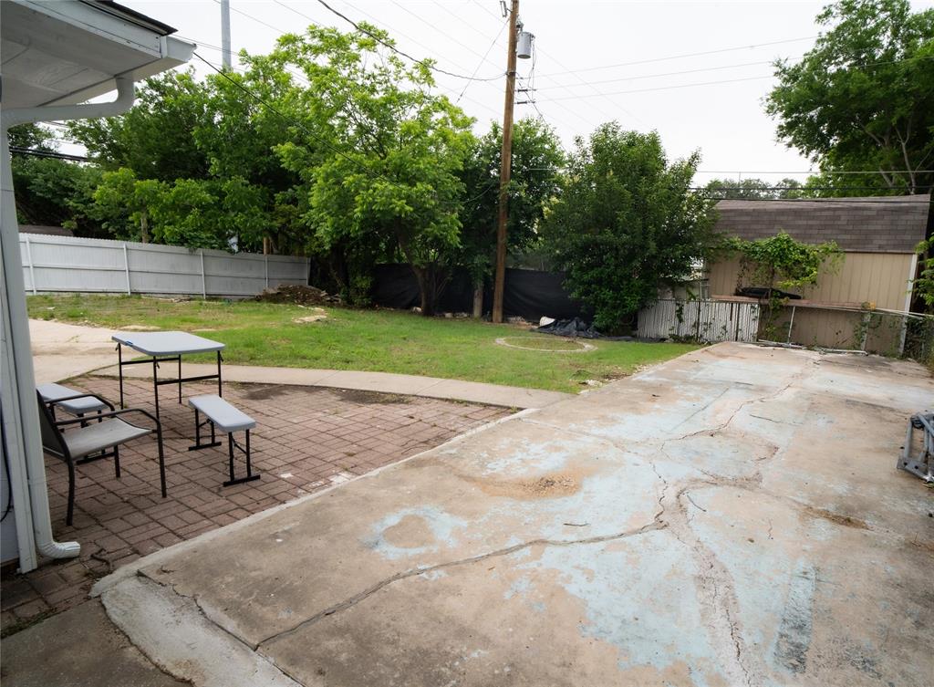 2136 Ridgeway Street Arlington, TX 76010 - Photo 26 of 32 a view of swimming pool with sitting area and garden