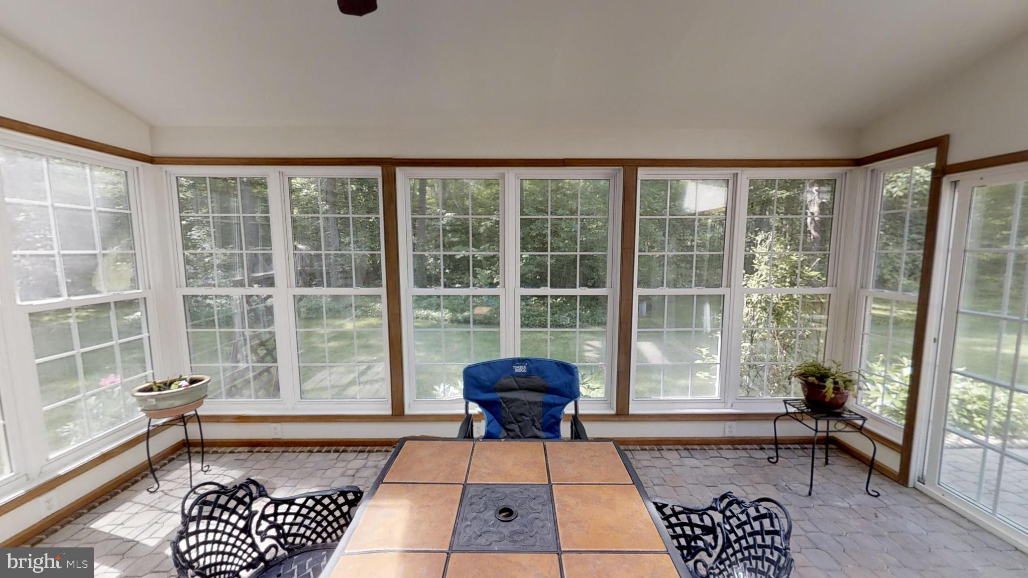 5870 Hallowing Point Road Prince Frederick, MD 20678 - Photo 14 of 72 Screen in porch/ sunroom with windows.