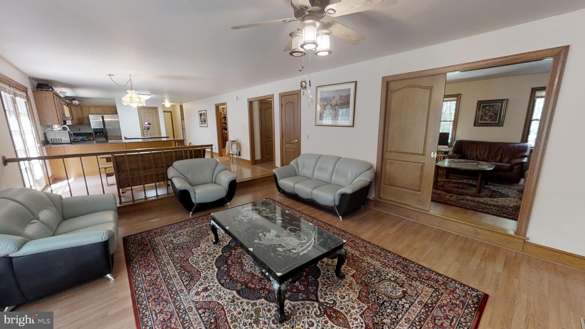 5870 Hallowing Point Road Prince Frederick, MD 20678 - Photo 36 of 72 Family room looking into the living room