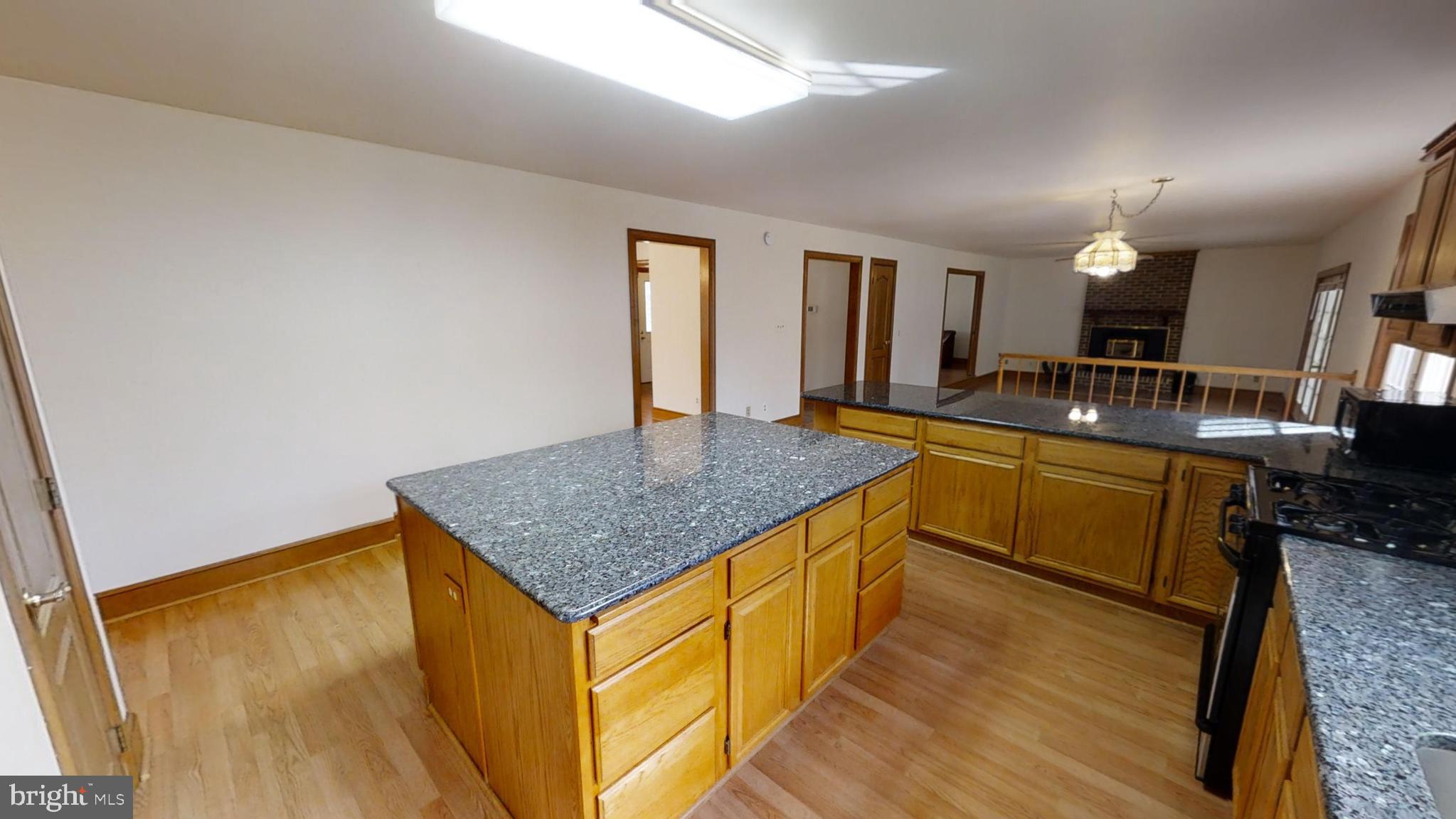 5870 Hallowing Point Road Prince Frederick, MD 20678 - Photo 6 of 72 Large island is one whole piece of granite.