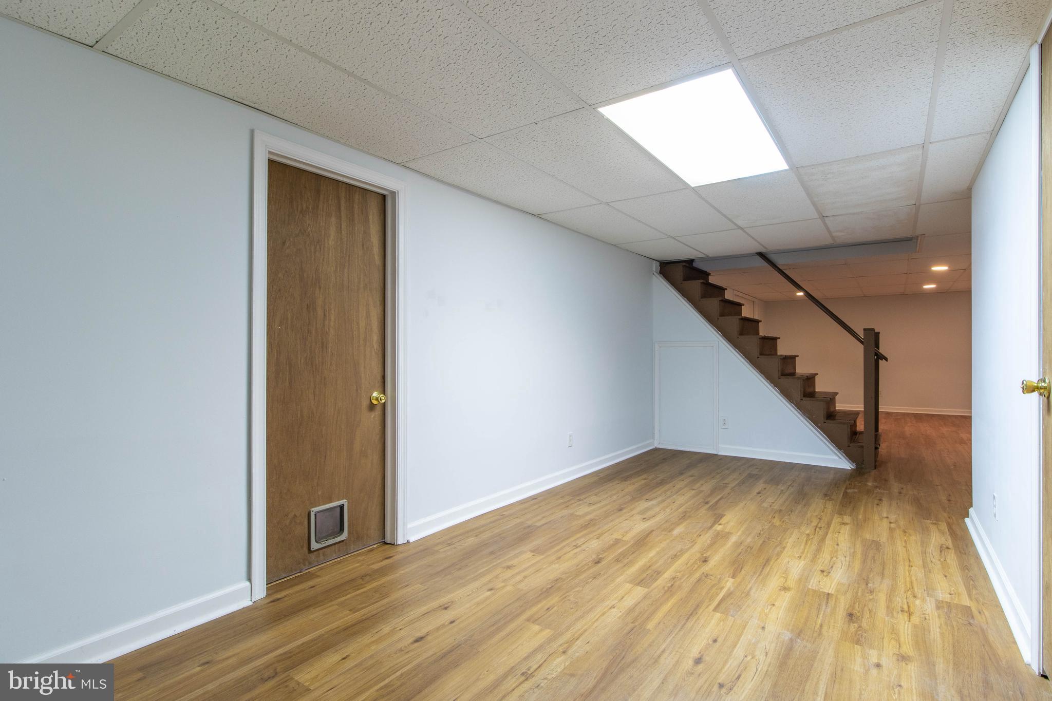 608 Rosedale Road Kennett Square, PA 19348 - Photo 21 of 30 a view of an empty room with wooden floor