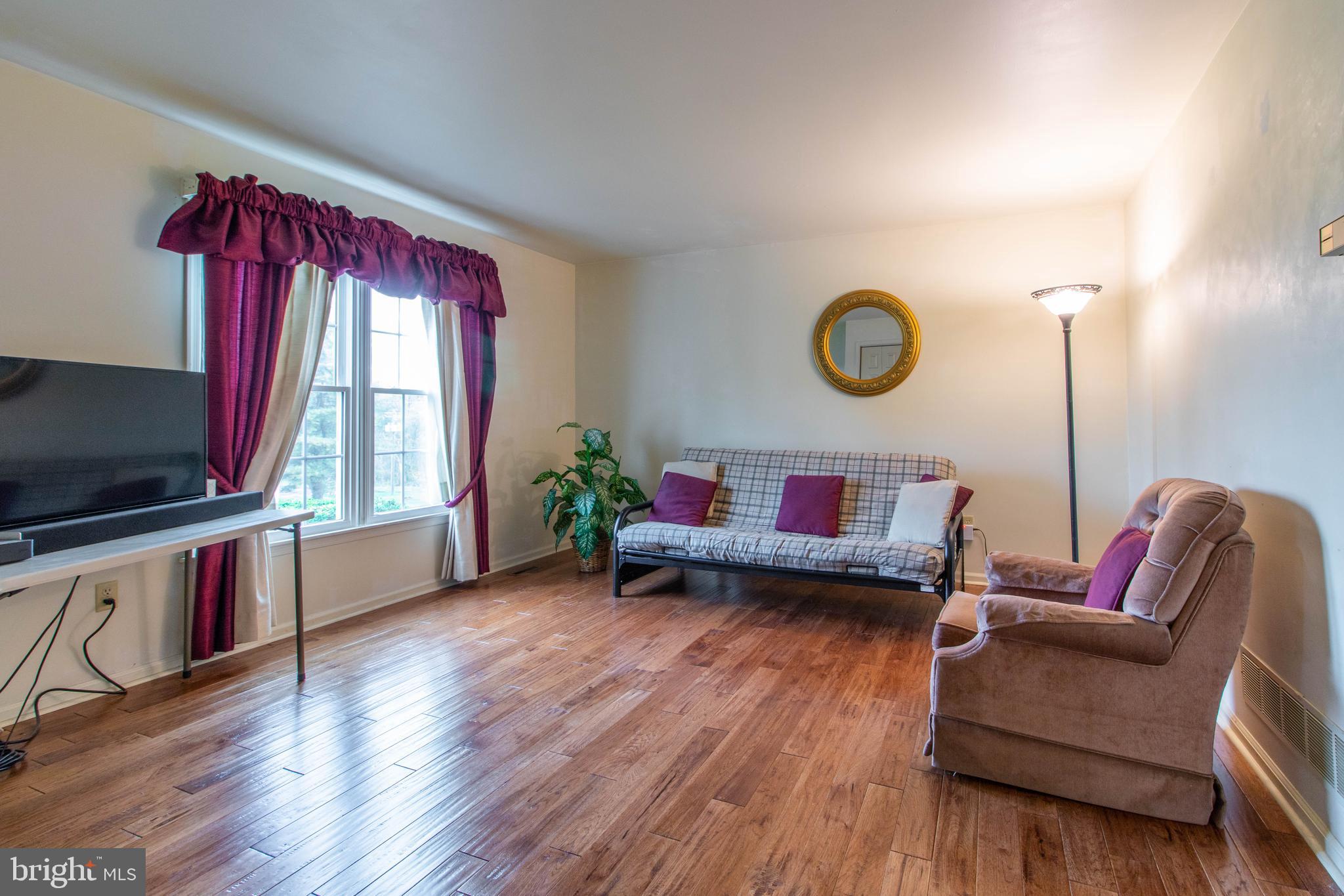 608 Rosedale Road Kennett Square, PA 19348 - Photo 4 of 30 a living room with furniture and a window