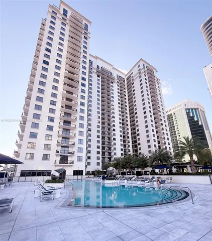 a view of a balcony and chairs